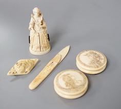 A pair of 19th century ivory balm pots, 3.75cm., a smallDieppe triptych figure, 6.5cm. a Meiji tiger brooch and a Dutch page marker.